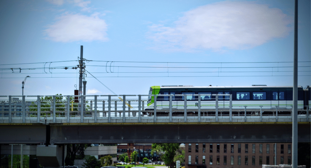 transit rail cable over railcars