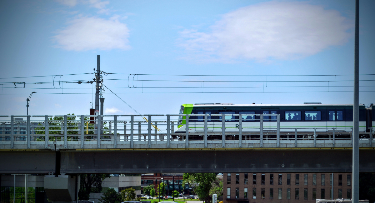 transit rail cable over railcars