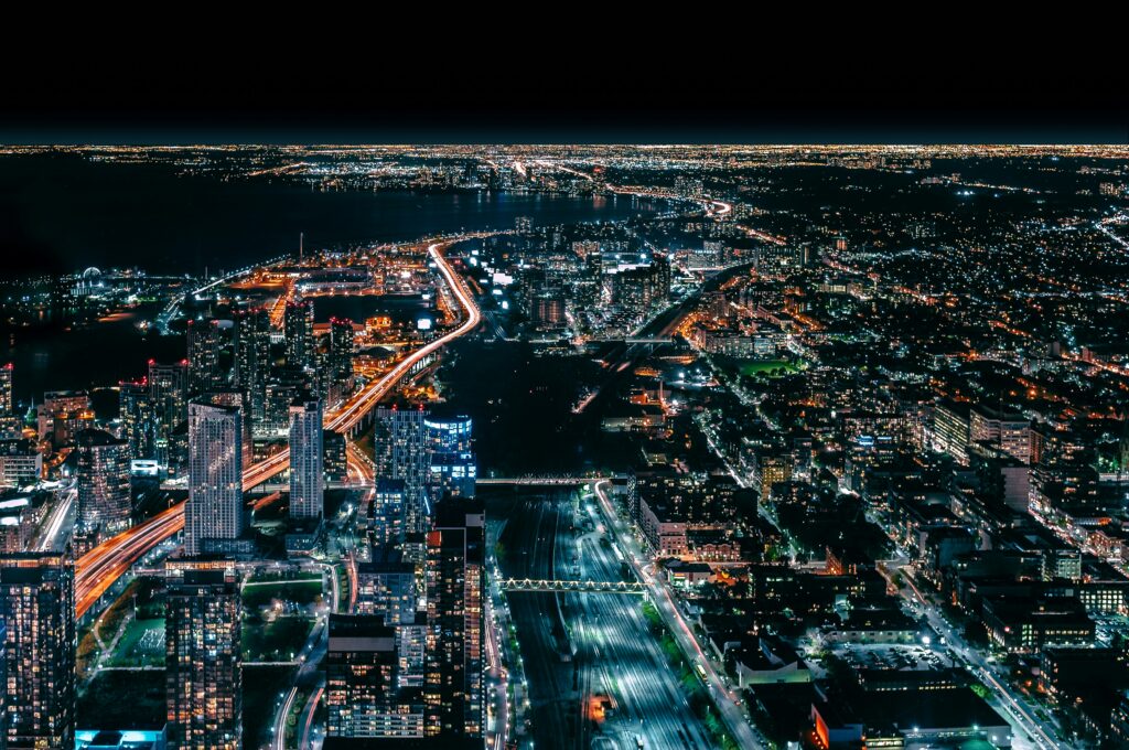City lit up with lights. | Photo by Arturo Castaneyra