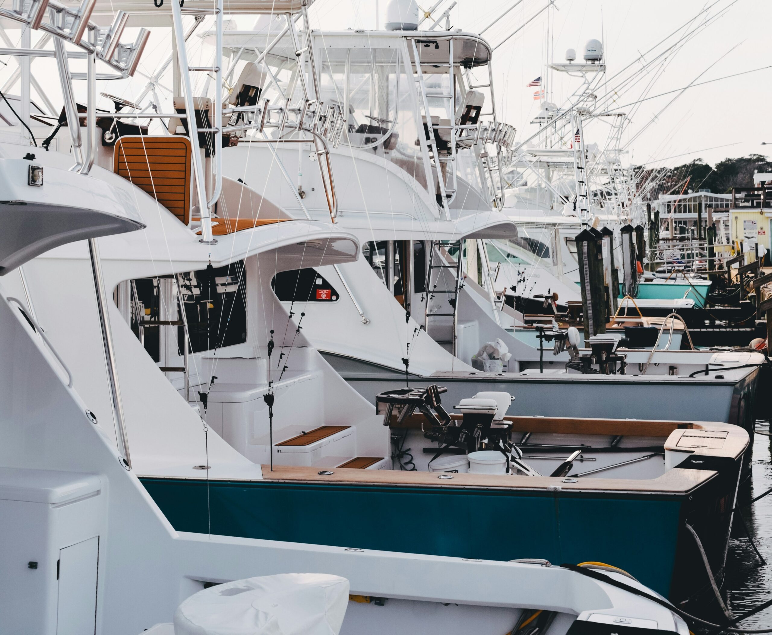 Boats lined up along a dock. | Photo by Rebecca Sorto